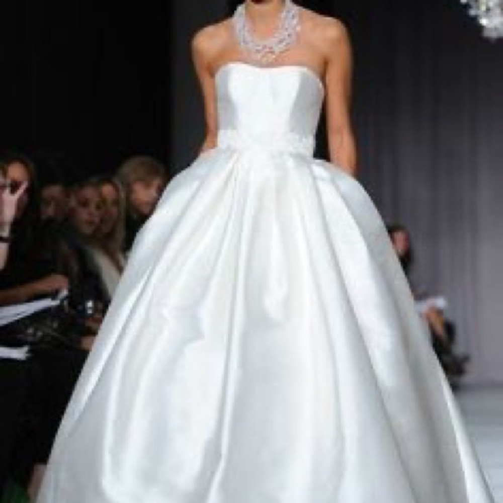 Altered white silk wedding dress with detailed train and pockets in size